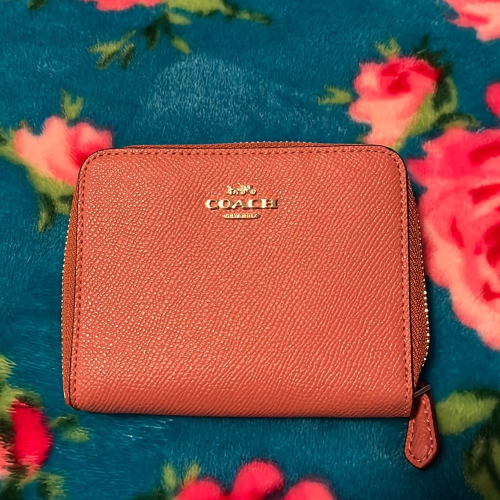 Brand new never been used Coach wallet.
